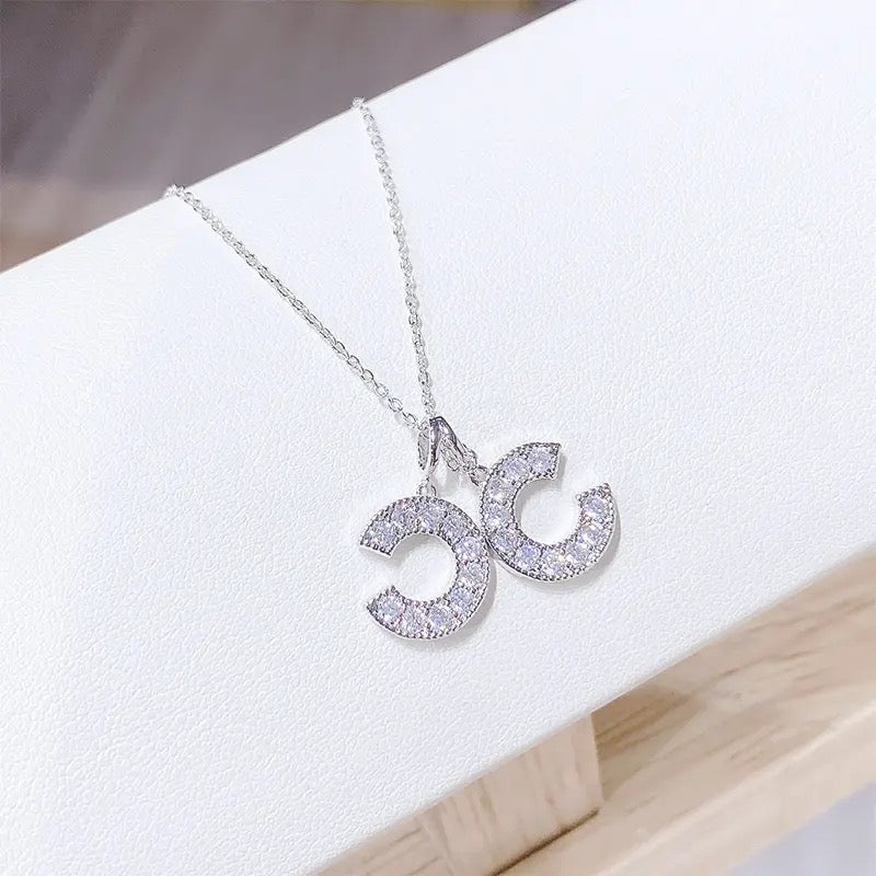 Swinging CCs Rhinestone Necklace