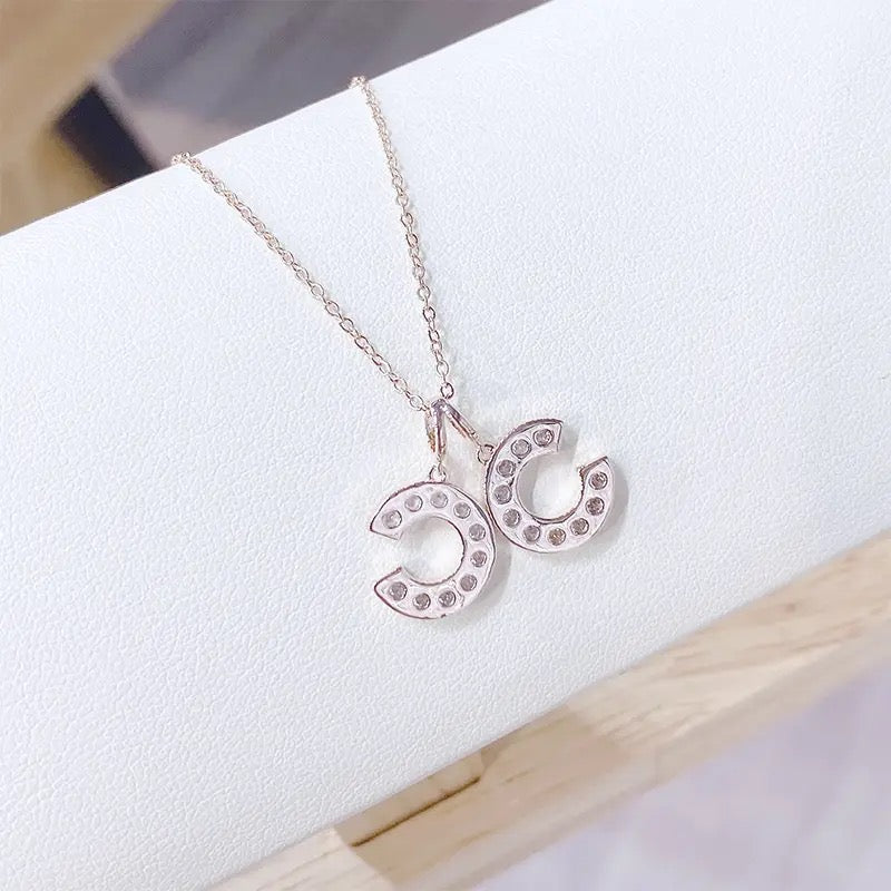 Swinging CCs Rhinestone Necklace